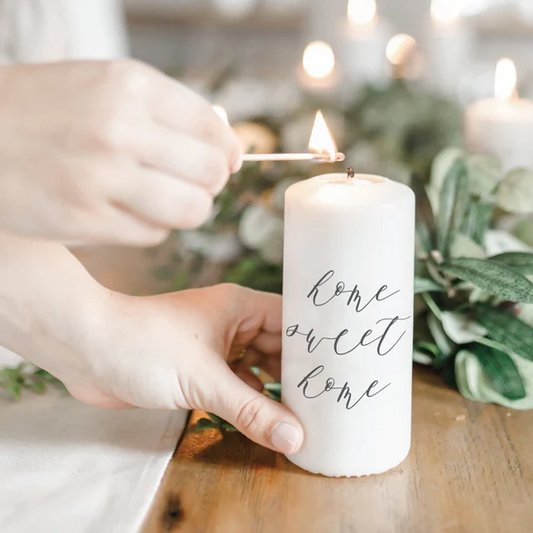The Home Sweet Home Gift Box in wood lidded box, home sweet home cotton table runner, home sweet home candle, 2 acacia wood pinch bowls, white tipped matches with gold embossed box, kosher chocolate almonds and kosher caramel candies
