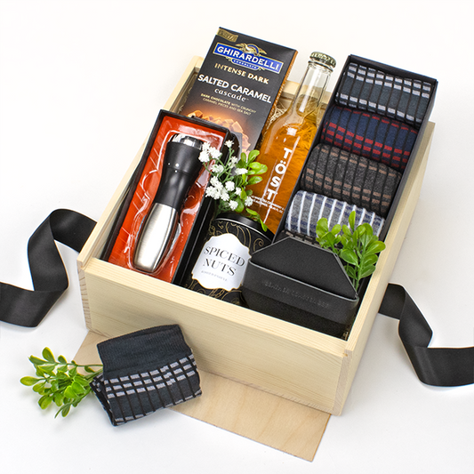 The Gentleman's Gear Gift Box set of dress socks, survival tool with flashlight, chocolate, TOST drink, faux leather coaster set, salted caramel chocolate in wooden gift box