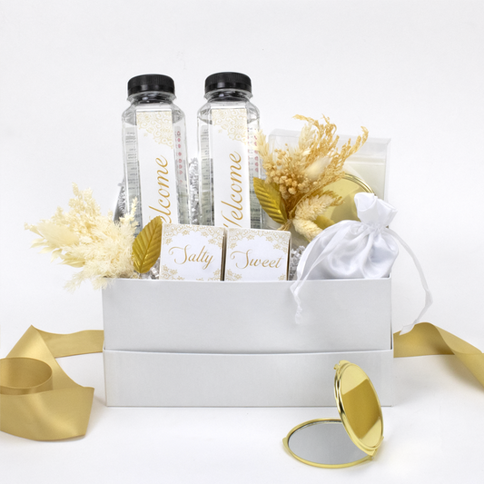 Welcome Guest Gift Box for weddings, bar mitzvah, special occasions, events, AirBNB owners, featuring drinks, amenities bag and treats.